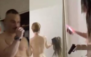 Travestis brincam com arma de policial após realizarem orgia em Motel; veja vídeo
